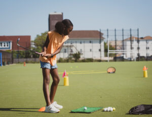 Girl Playing Golf